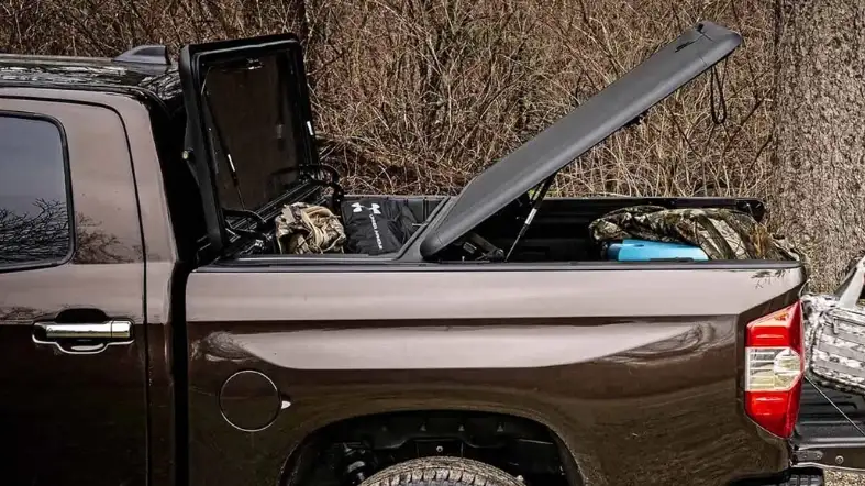 Are there any installation tips for using a tonneau cover with a toolbox