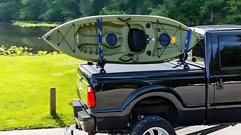 How do you haul a kayak on a truck with a tonneau cover